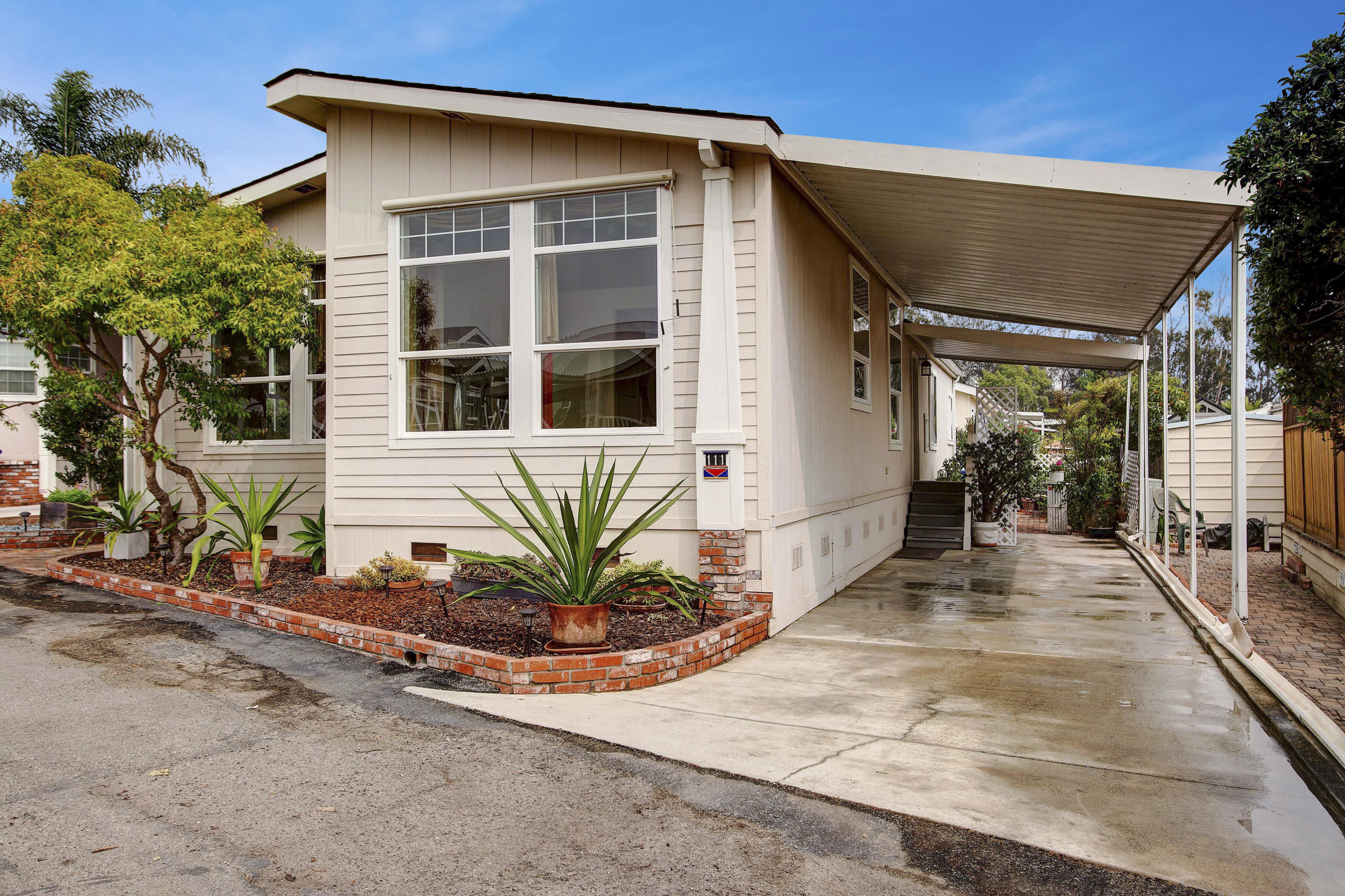 30 Winchester Canyon Road, Unit SPC 111 Goleta, CA 93117 - Photo 3 of 25 a house view with a outdoor space