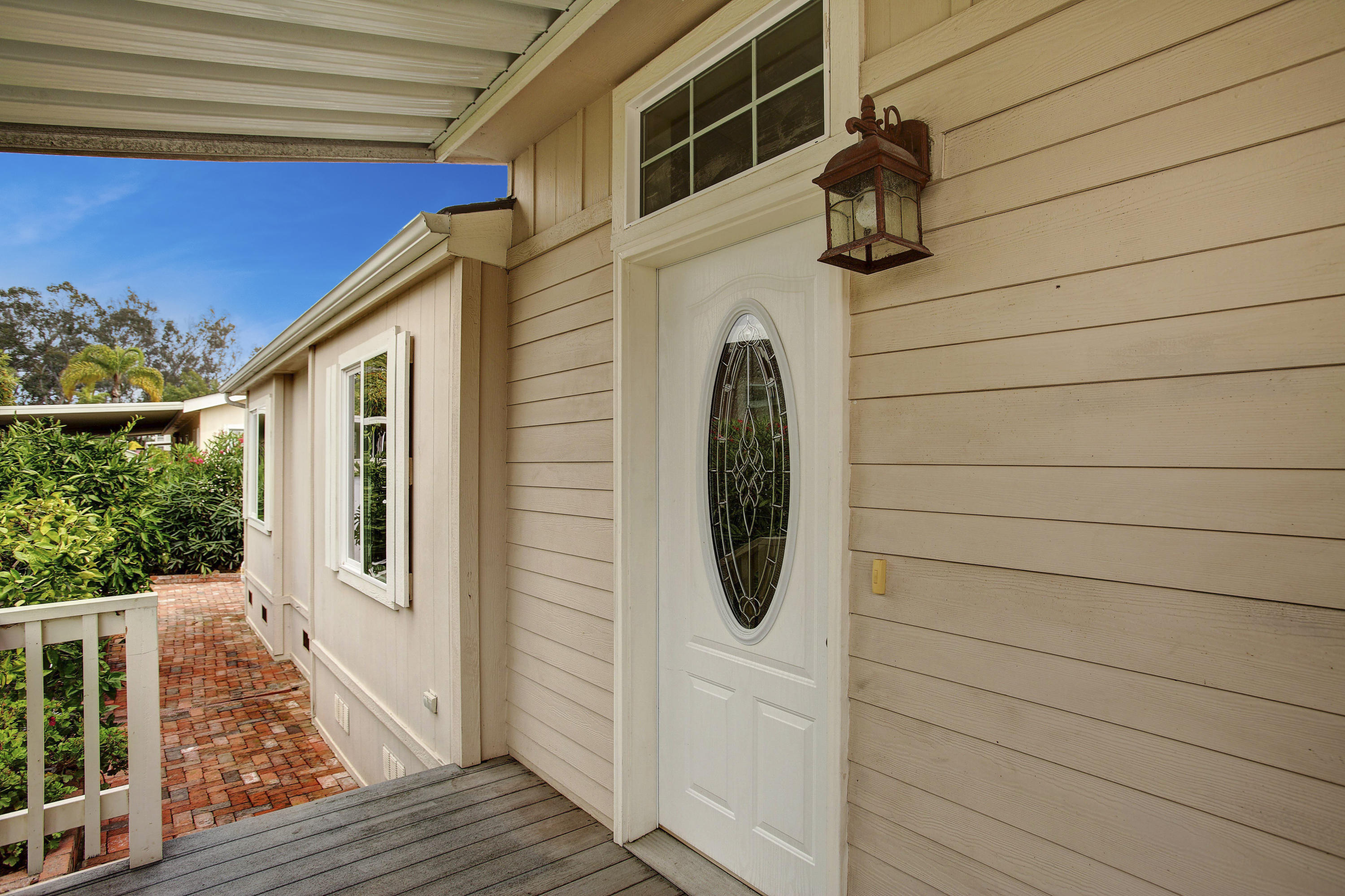 30 Winchester Canyon Road, Unit SPC 111 Goleta, CA 93117 - Photo 4 of 25 a view of a house with entryway and wooden floor