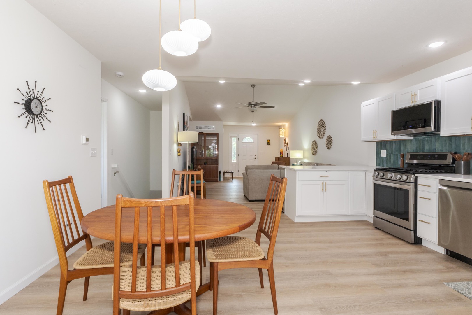 221 Cassidy Road Normal, IL 61761 - Photo 15 of 40 a view of a dining room with furniture and a kitchen