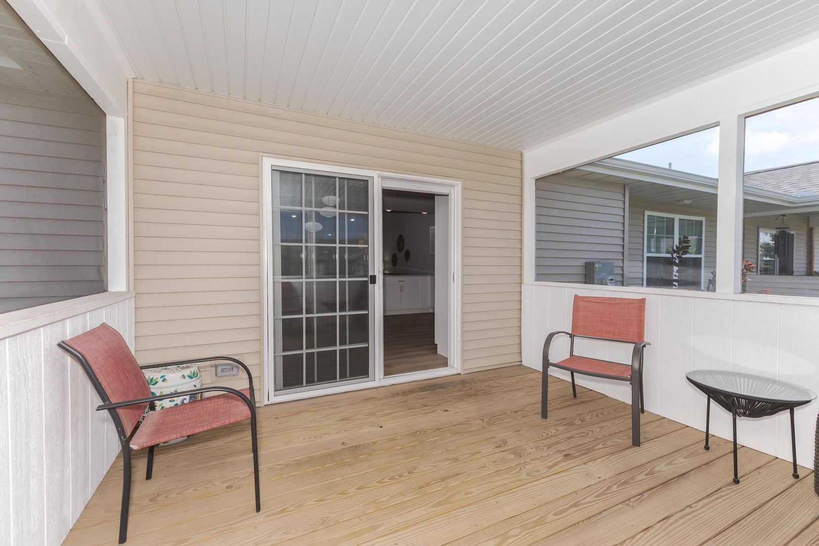 221 Cassidy Road Normal, IL 61761 - Photo 21 of 40 a view of a chair and table in the back yard of the house
