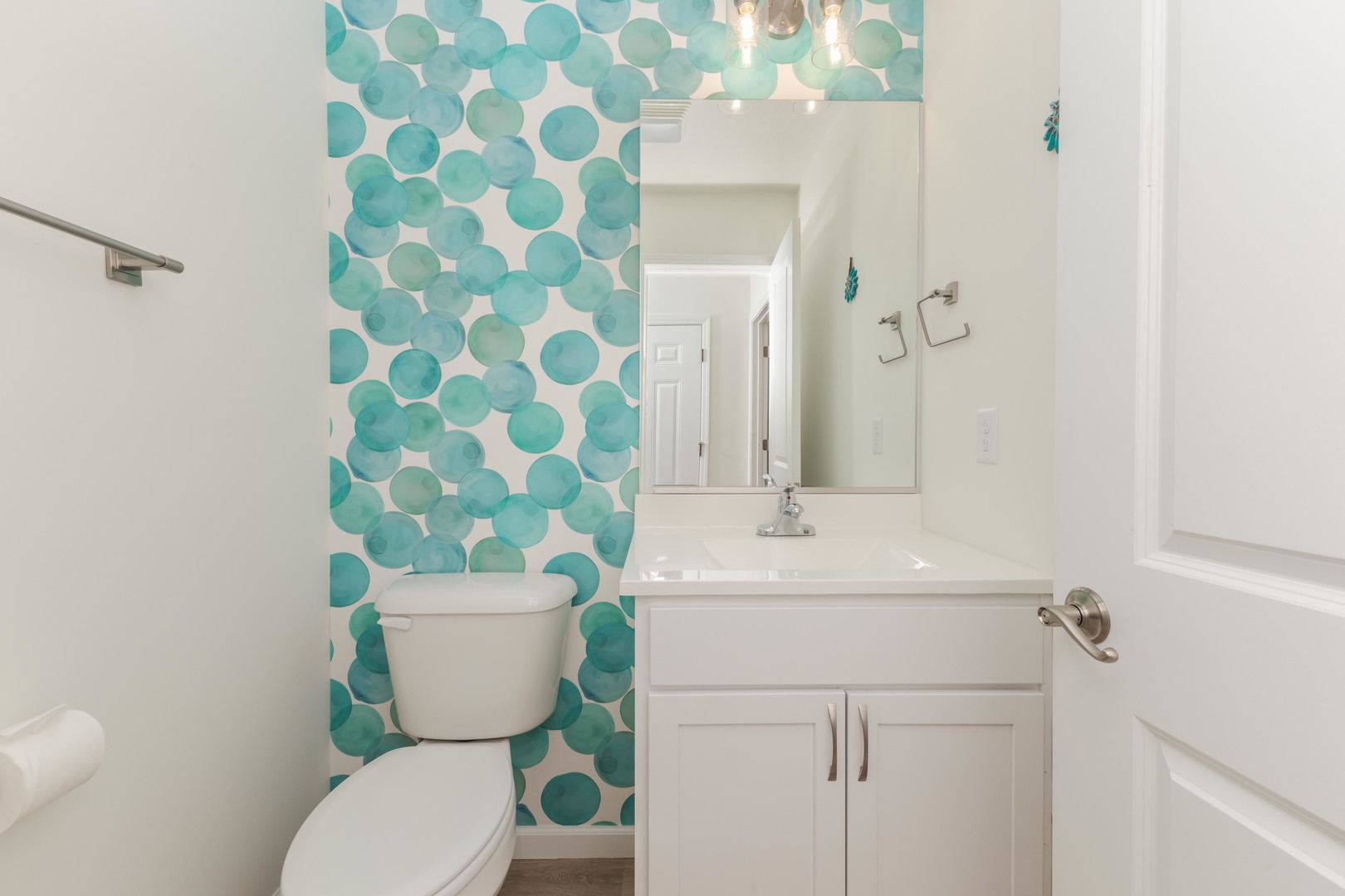 221 Cassidy Road Normal, IL 61761 - Photo 23 of 40 a bathroom with a sink mirror vanity and a toilet