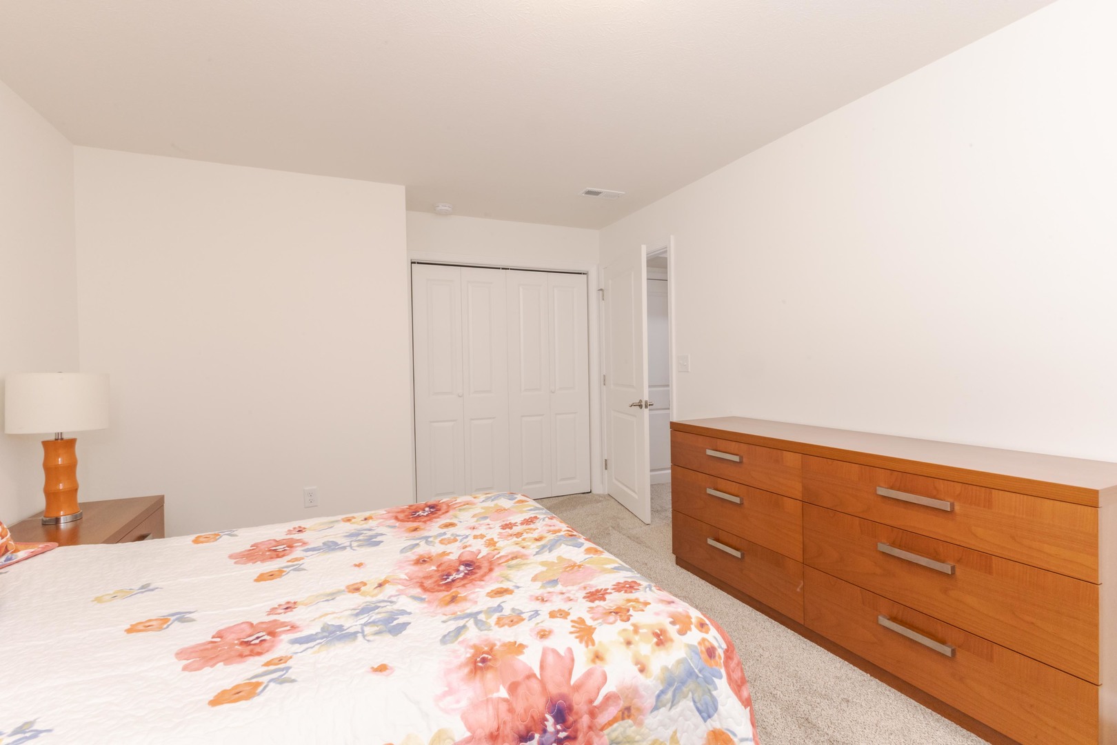 221 Cassidy Road Normal, IL 61761 - Photo 28 of 40 a bedroom with a bed and a dresser