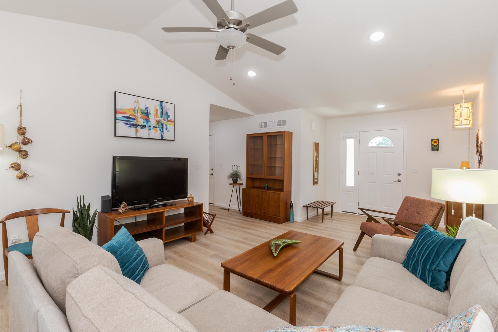 221 Cassidy Road Normal, IL 61761 - Photo 10 of 40 a living room with furniture and a flat screen tv