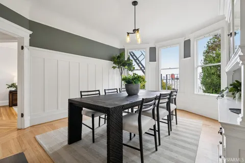 a plant that is sitting in front of a house