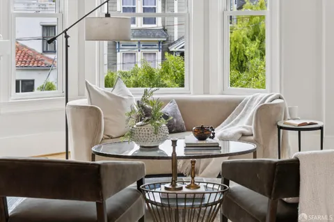 a kitchen with stainless steel appliances kitchen island granite countertop a sink and cabinets
