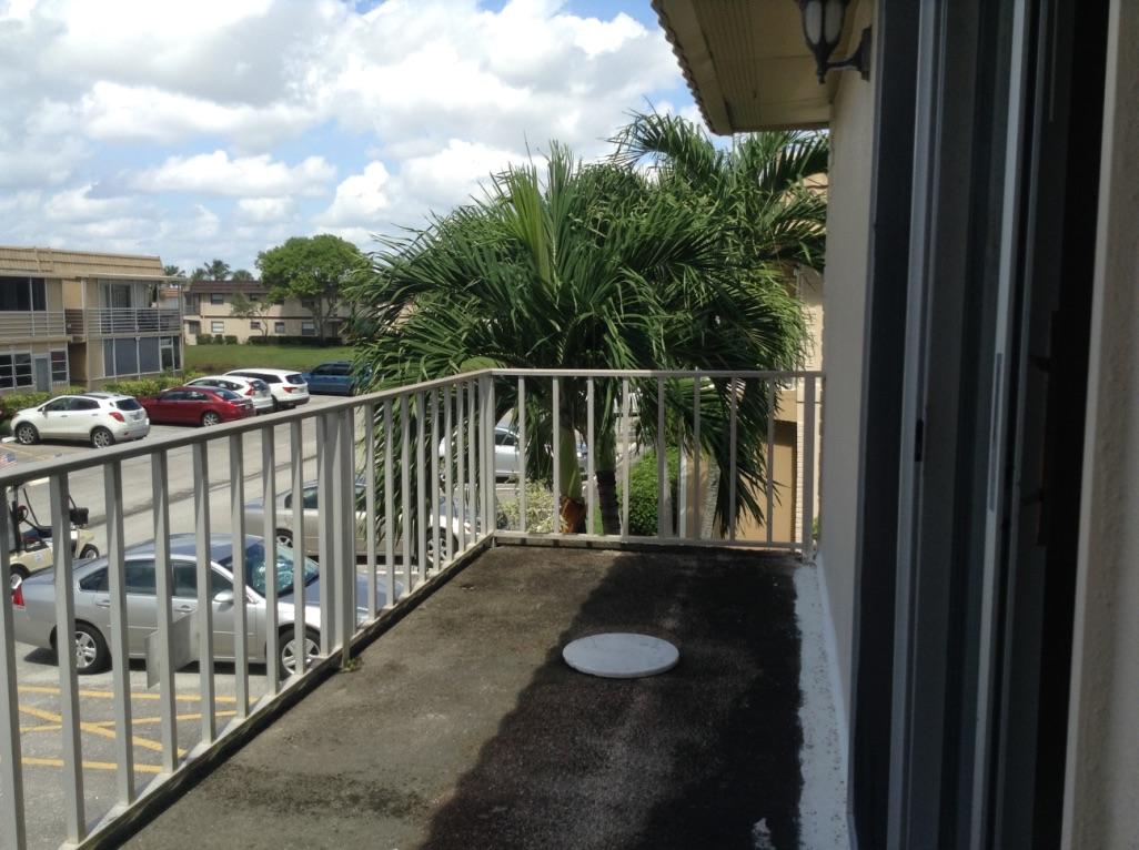 186 Monaco Way, Unit 186 Delray Beach, FL 33446 - Photo 20 of 31 186 Monaco Balcony 1
