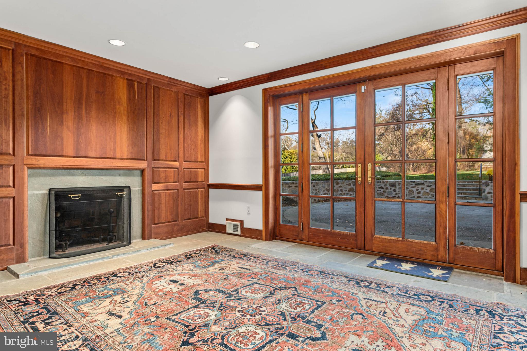 188 Abrahams Lane Villanova, PA 19085 - Photo 15 of 49 a view of a livingroom with a fireplace and large window
