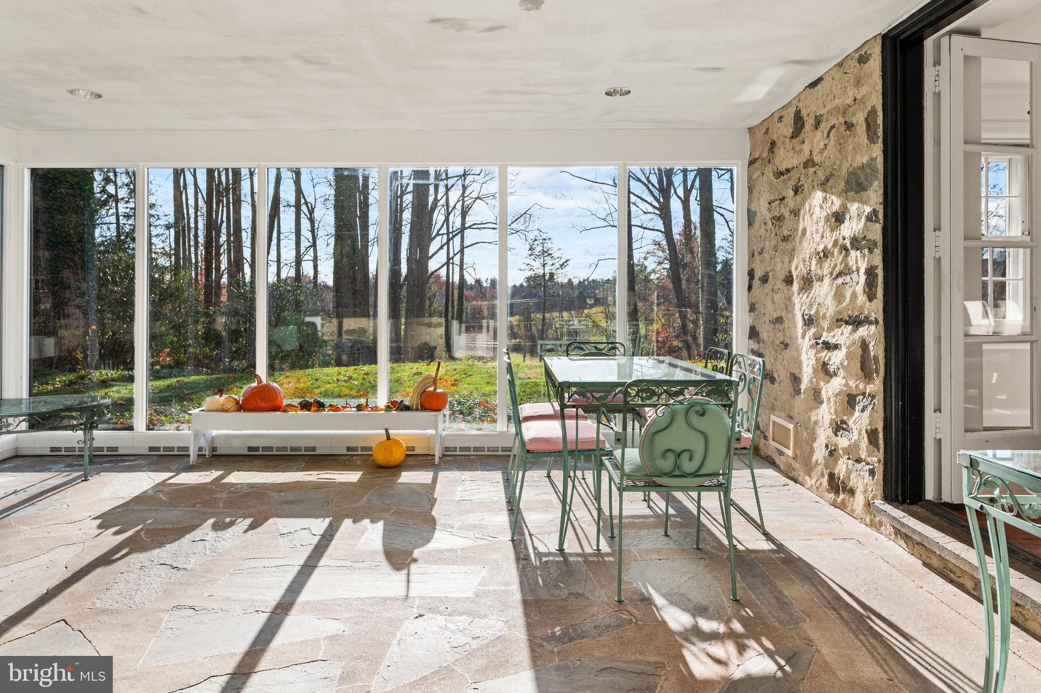 188 Abrahams Lane Villanova, PA 19085 - Photo 22 of 49 a living room filled with furniture and a large window