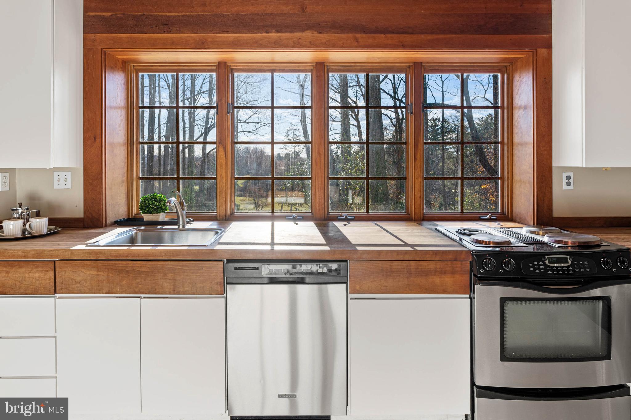 188 Abrahams Lane Villanova, PA 19085 - Photo 31 of 49 a kitchen with a stove and a sink