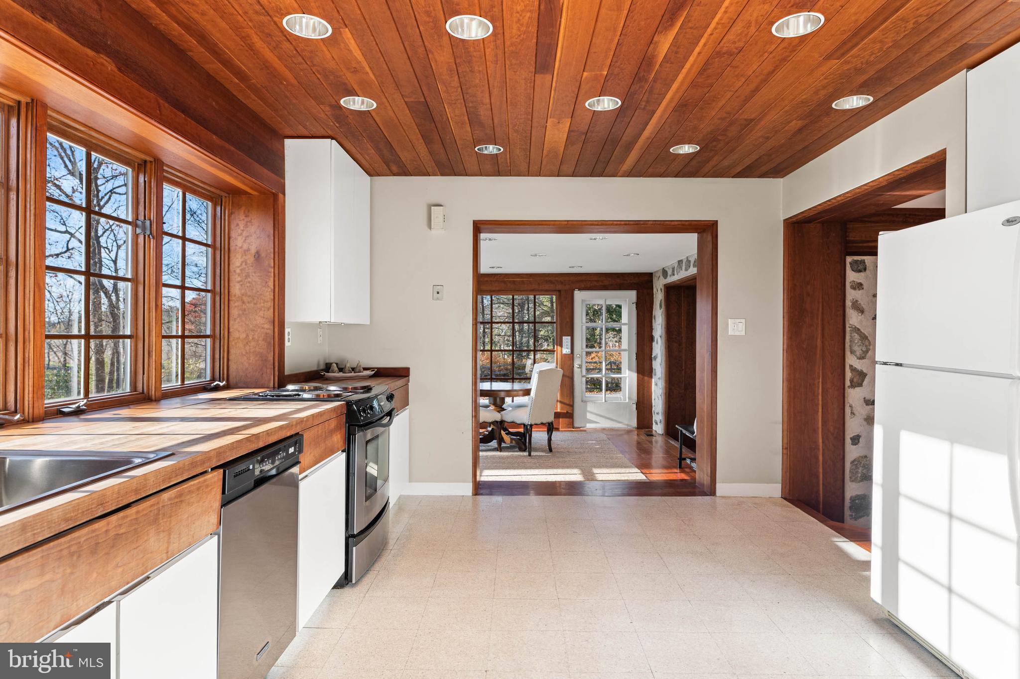 188 Abrahams Lane Villanova, PA 19085 - Photo 32 of 49 a kitchen with stainless steel appliances granite countertop a sink and a stove