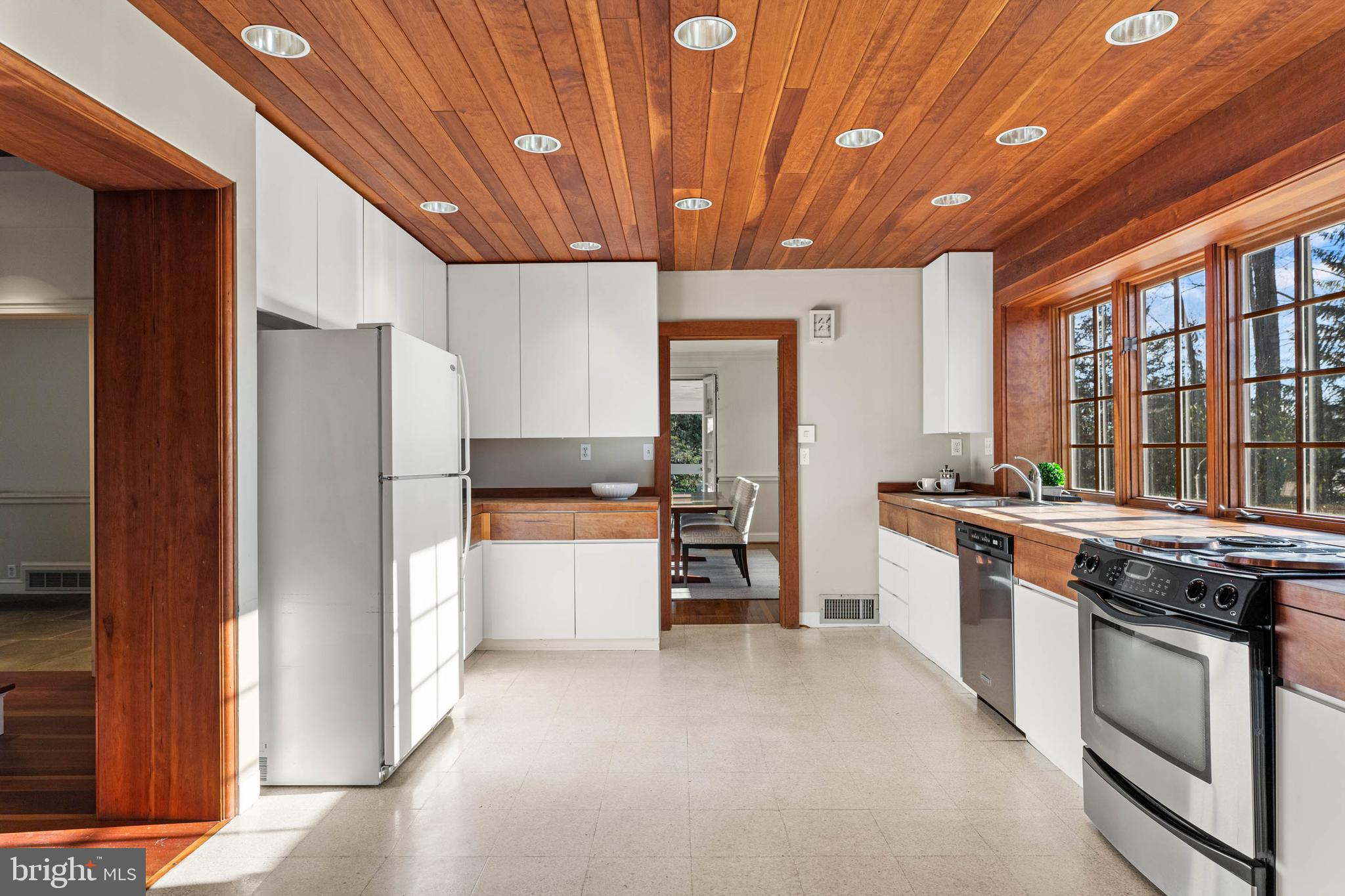 188 Abrahams Lane Villanova, PA 19085 - Photo 34 of 49 a large kitchen with stainless steel appliances granite countertop a stove and a refrigerator