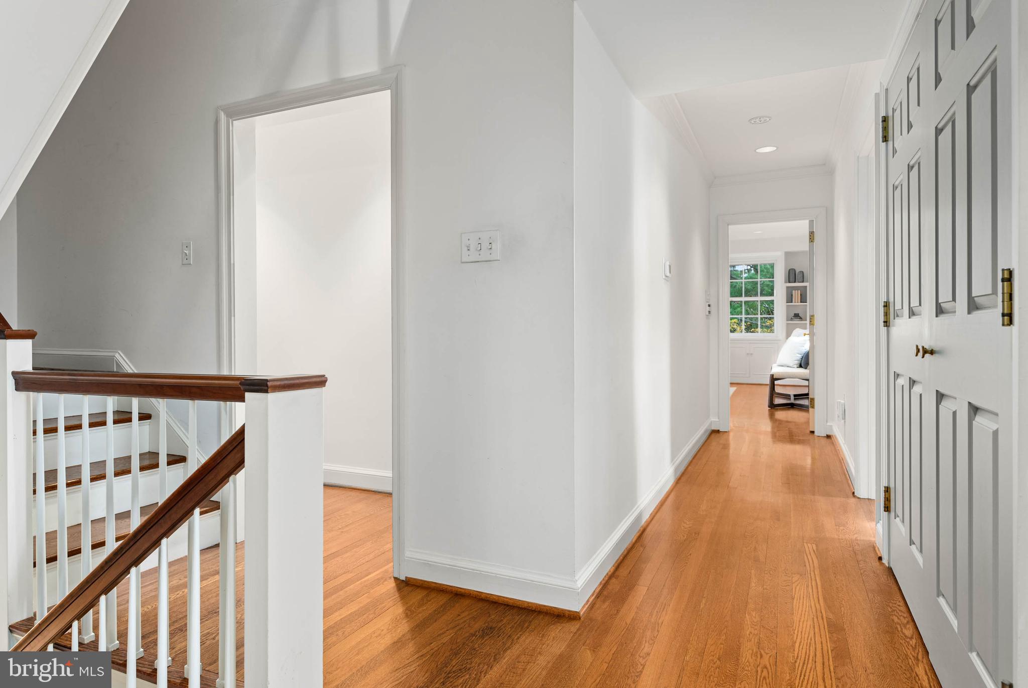 188 Abrahams Lane Villanova, PA 19085 - Photo 35 of 49 a view of a hallway with wooden floor and staircase