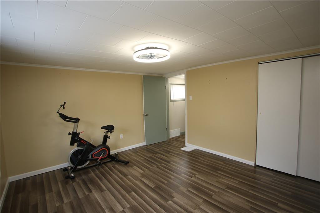 1930 State Rte 2023 Monongahela, PA 15063 - Photo 13 of 41 a view of a room with wooden floor and a ceiling fan