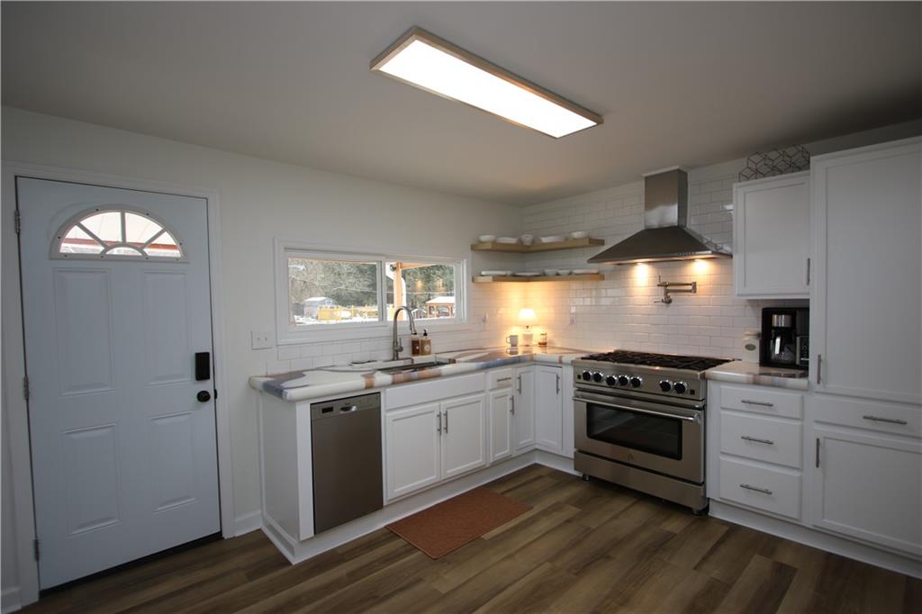 1930 State Rte 2023 Monongahela, PA 15063 - Photo 2 of 41 a kitchen with a stove and a sink