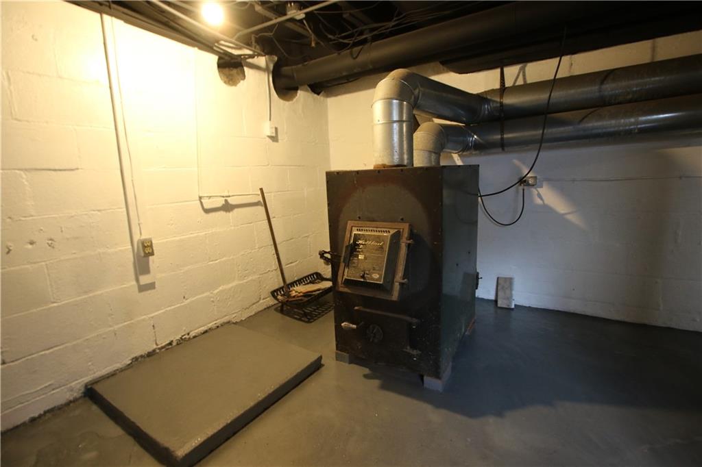 1930 State Rte 2023 Monongahela, PA 15063 - Photo 26 of 41 a view of a room with water heater and wooden racks