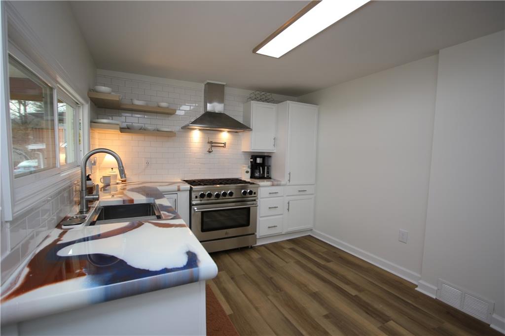 1930 State Rte 2023 Monongahela, PA 15063 - Photo 4 of 41 a kitchen with a sink and a stove top oven
