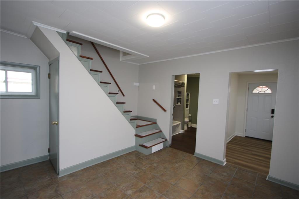 1930 State Rte 2023 Monongahela, PA 15063 - Photo 5 of 41 a view of an empty room with stairs and furniture