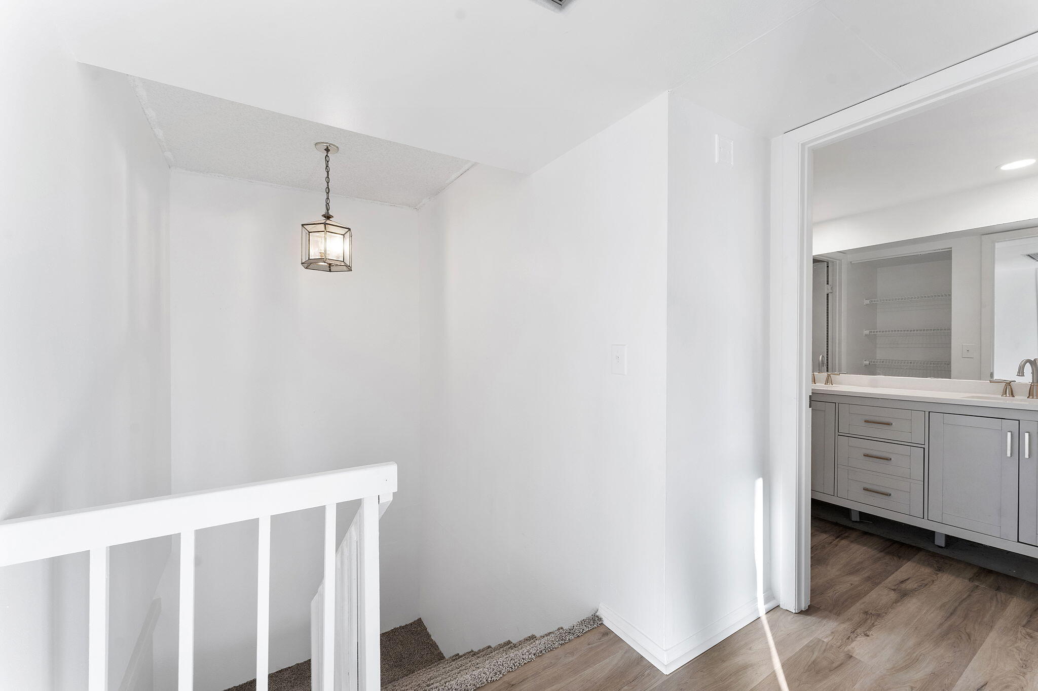 291 Woodland Road Palm Springs, FL 33461 - Photo 16 of 32 a view of a room with a mirror and a fan