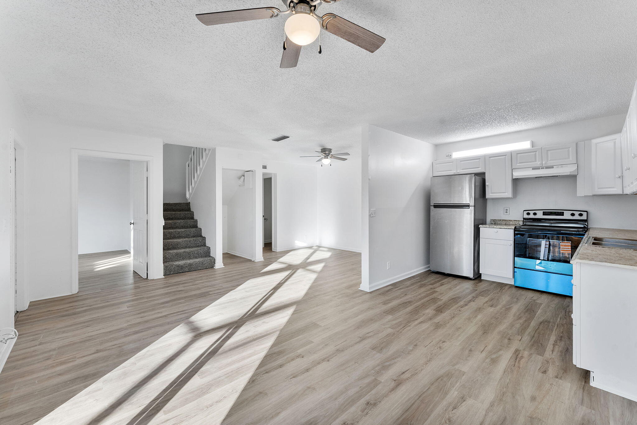 291 Woodland Road Palm Springs, FL 33461 - Photo 5 of 32 a view of kitchen with sink and refrigerator