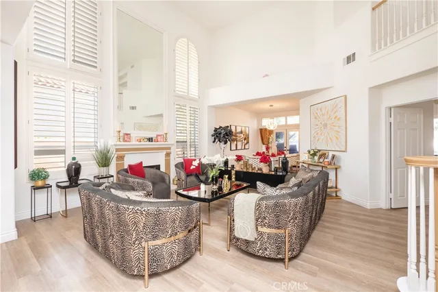 a living room with granite countertop furniture and a kitchen view