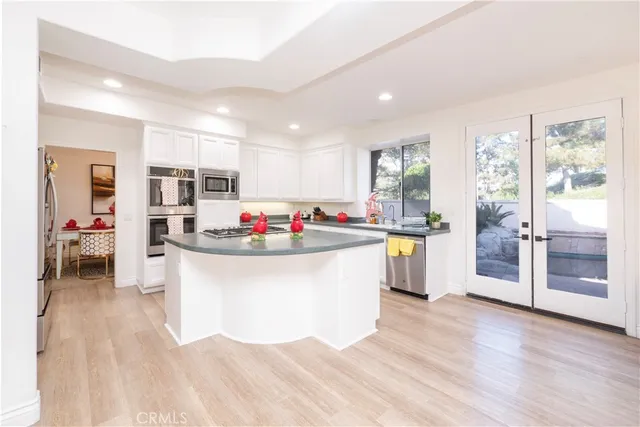 a living room with furniture and flat screen tv