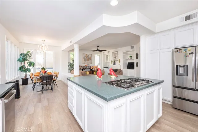 a view of livingroom with furniture fire place and windows