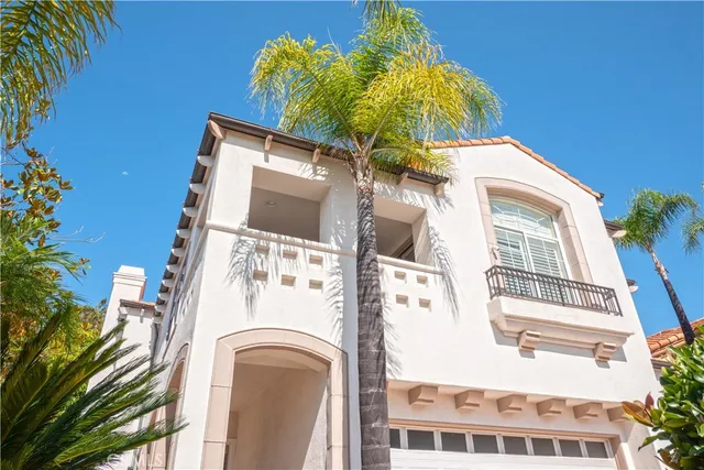 an aerial view of residential houses and outdoor space