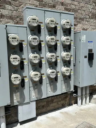 a view of kitchen appliances and cabinets