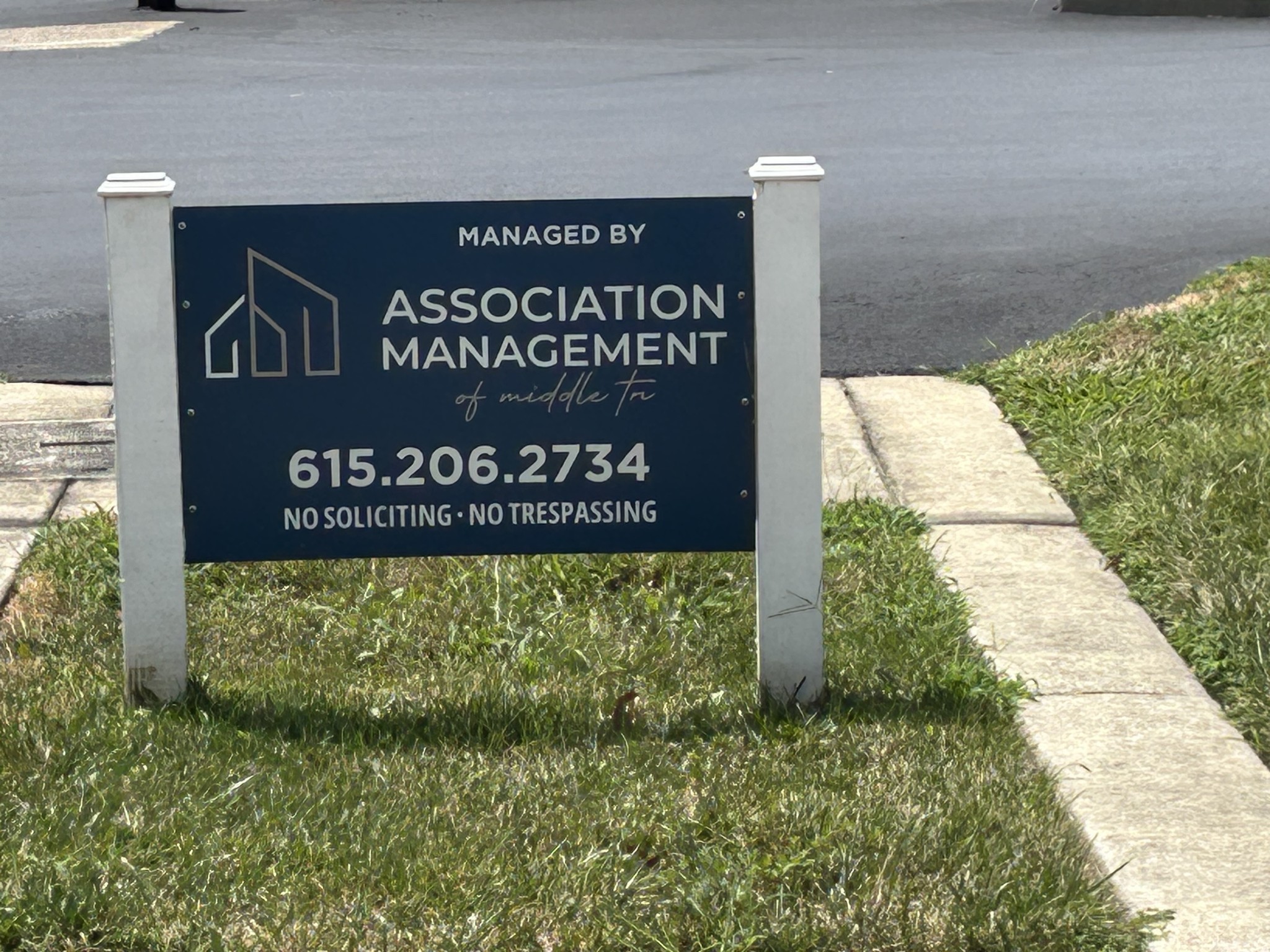1319 West Main Street, Unit 108 Franklin, TN 37064 - Photo 25 of 25 a sign that is sitting on a brick wall