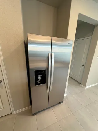 a utility room with washer and dryer