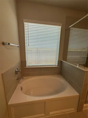 a kitchen with a sink and a refrigerator
