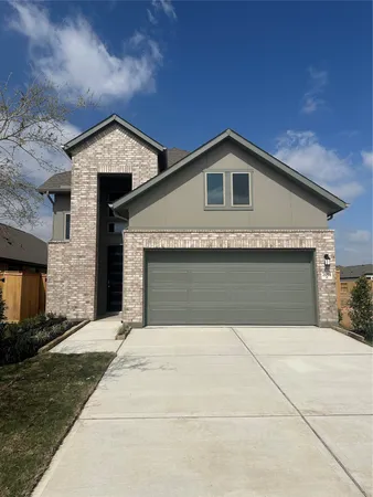 a front view of a house with yard