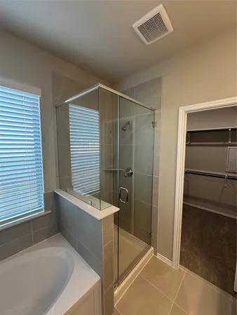 a utility room with a sink dryer and washer