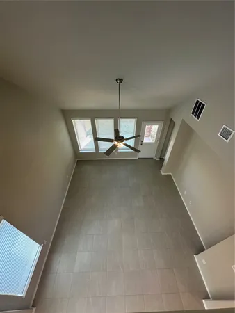 a kitchen with stainless steel appliances a sink a stove top oven a counter space and cabinets