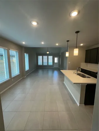 a view of a kitchen with a sink