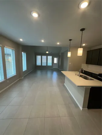 a view of a kitchen with a sink