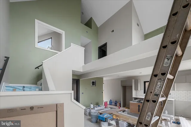 a view of living room with furniture and flat screen tv