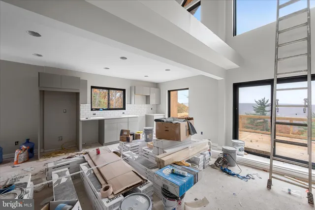 a bedroom with a bed and a night stand