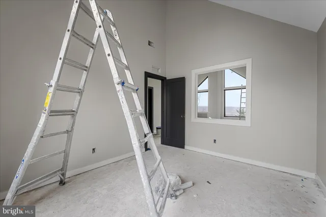a view of a livingroom with stairs