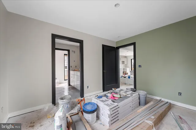a view of a livingroom with furniture and a window