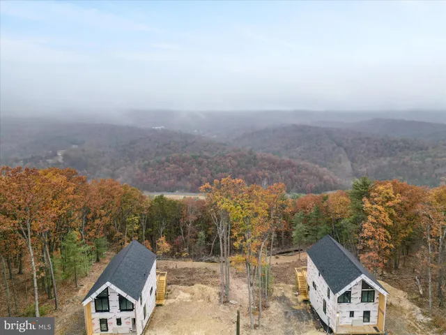 a view of a house with a mountain
