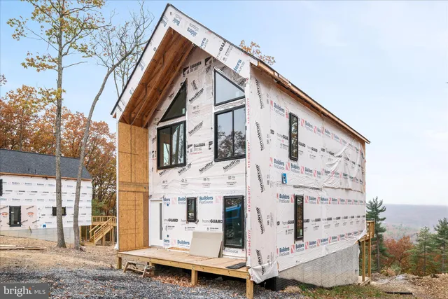 a view of a house with a iron stairs