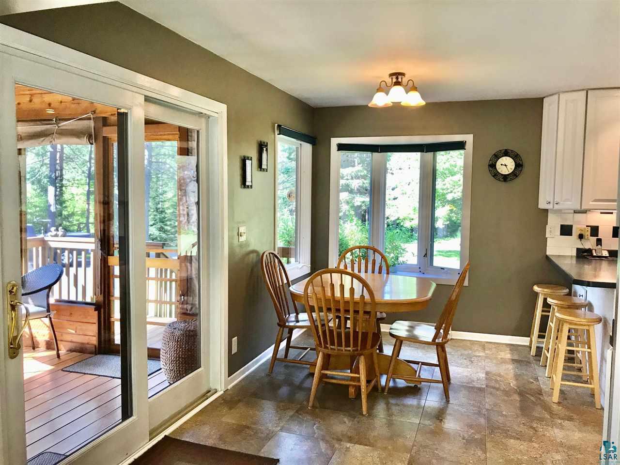 2616 Swan Lake Road Duluth, MN 55811 - Photo 16 of 47 WALK OUT TO SCREEN ROOM FROM KITCHEN
