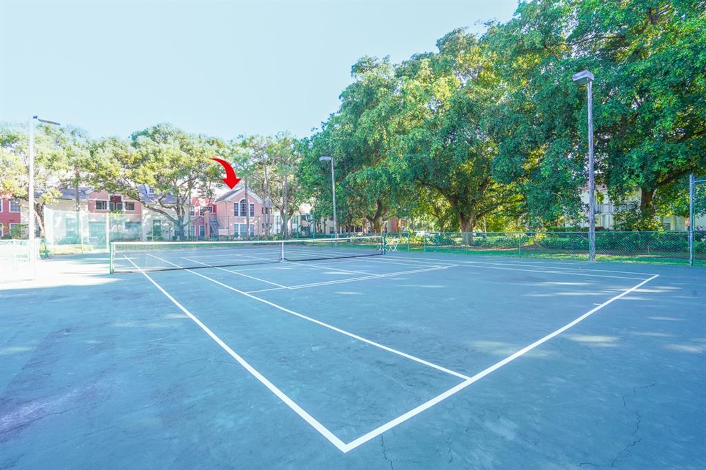1011 Crystal Way, Unit P Delray Beach, FL 33444 - Photo 22 of 28 a view of a tennis court