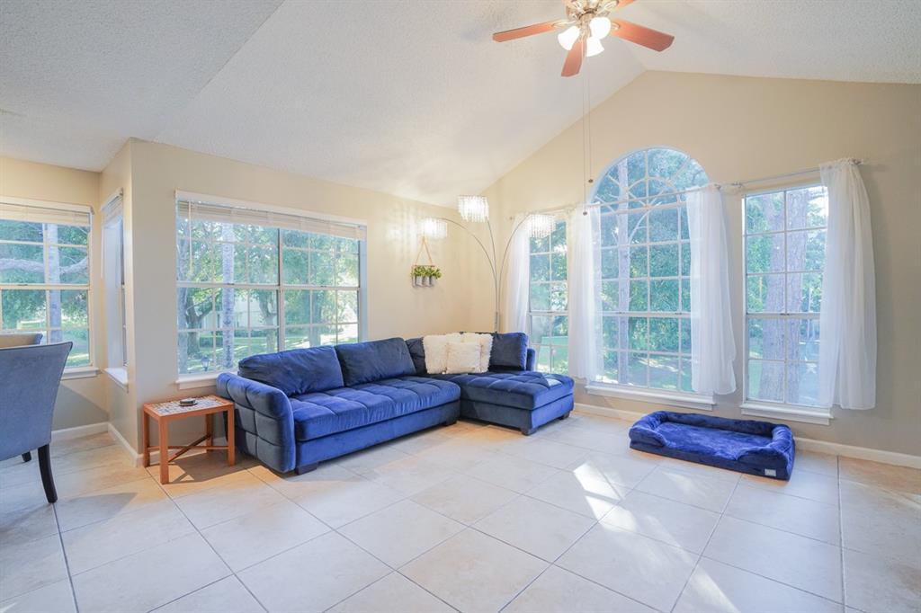 1011 Crystal Way, Unit P Delray Beach, FL 33444 - Photo 4 of 28 a living room with furniture and a large window