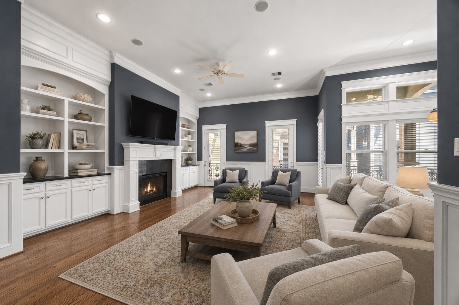 619 Rutland Street, Unit B Houston, TX 77007 - Photo 2 of 33 a living room with furniture a fireplace and a flat screen tv