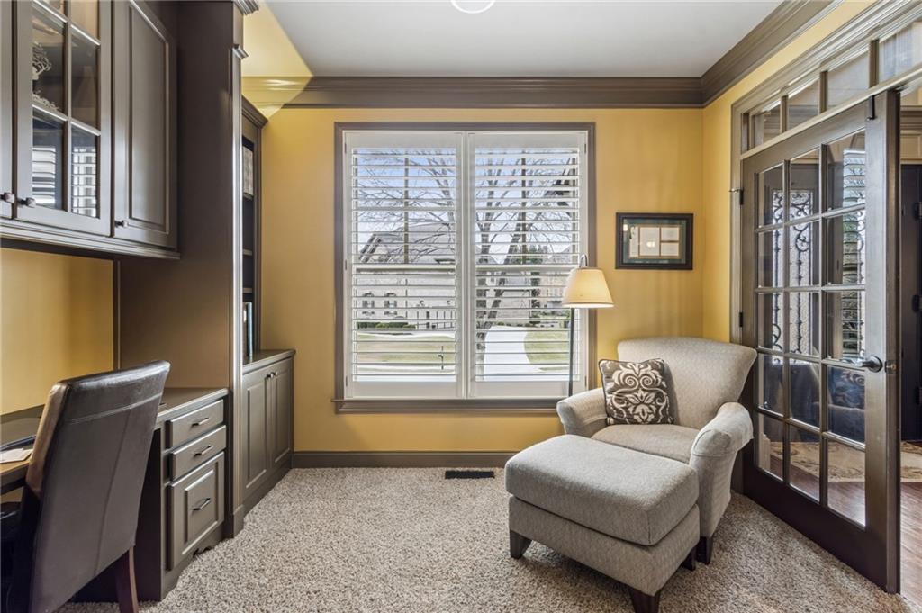 2391 Hopehaven Way Hoschton, GA 30548 - Photo 19 of 87 a living room with furniture and a window