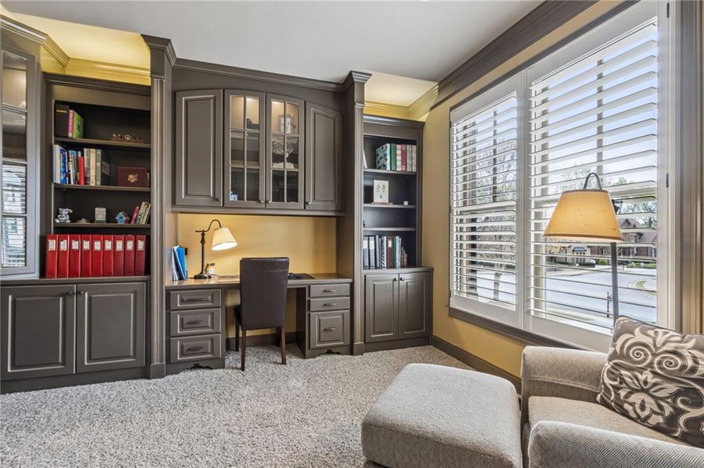 2391 Hopehaven Way Hoschton, GA 30548 - Photo 20 of 87 a living room with furniture and a window