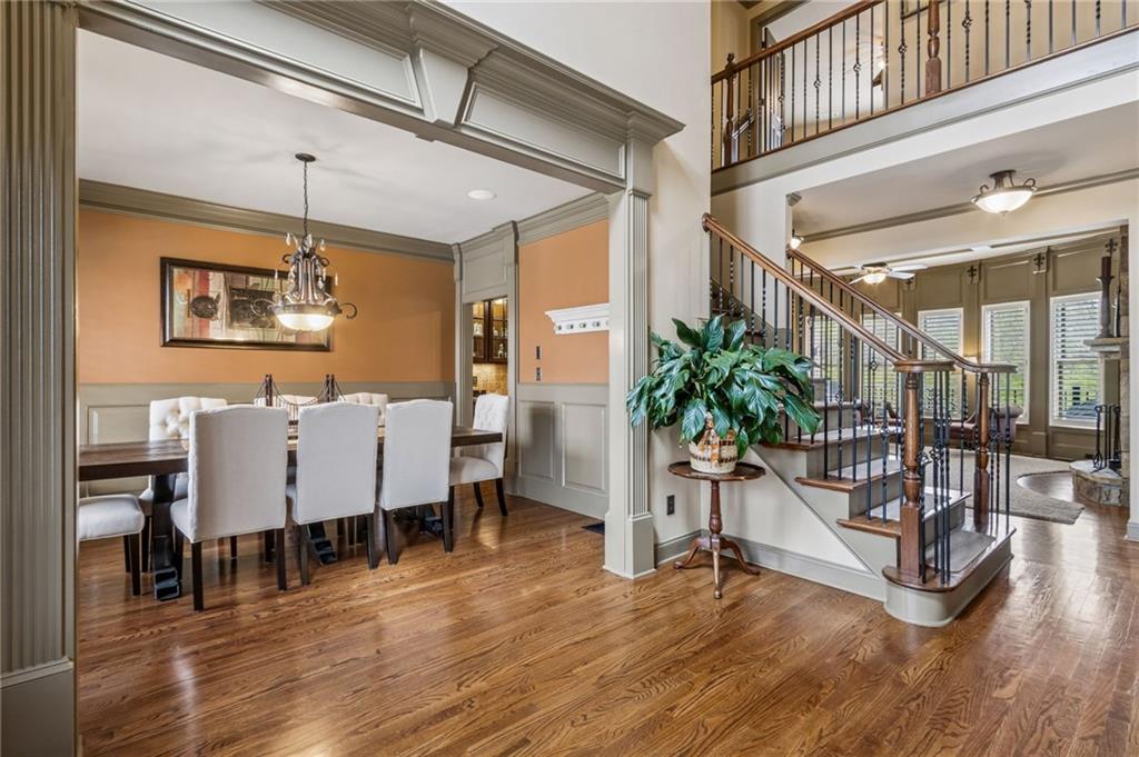2391 Hopehaven Way Hoschton, GA 30548 - Photo 3 of 87 a view of a livingroom with furniture and floor to ceiling window