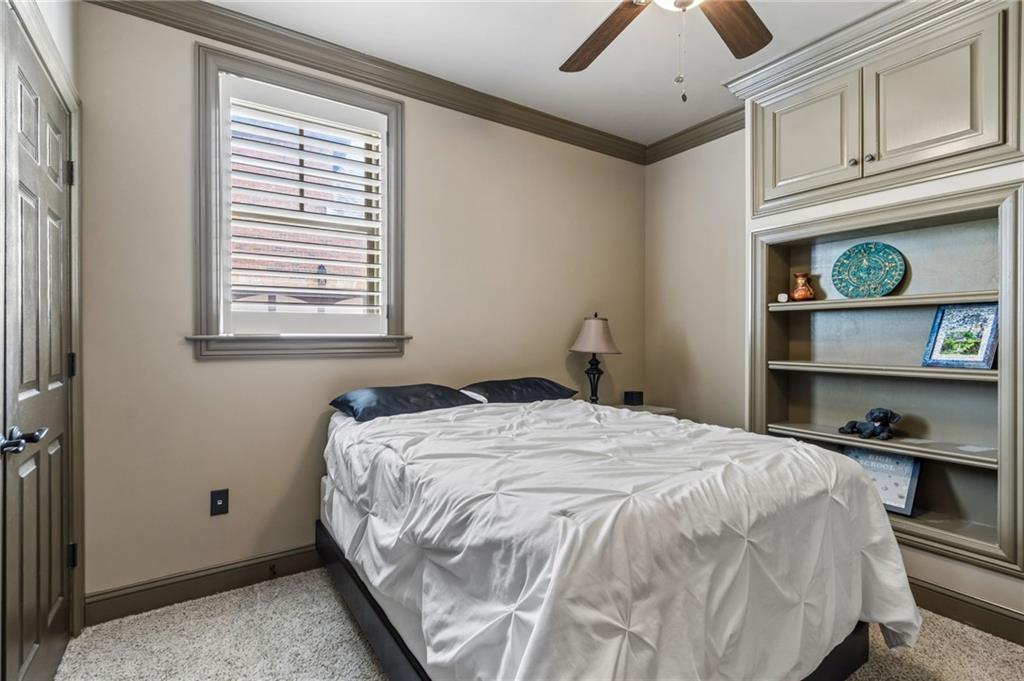 2391 Hopehaven Way Hoschton, GA 30548 - Photo 69 of 87 a bedroom with a bed and a window